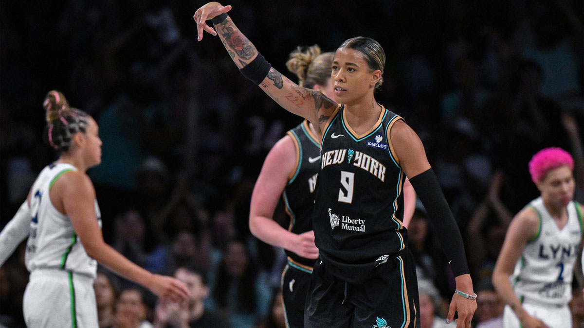 New York Liberty guard Natasha Cloud (9) reacts after making a shot during the second half against the Minnesota Lynx at Barclays Center. 