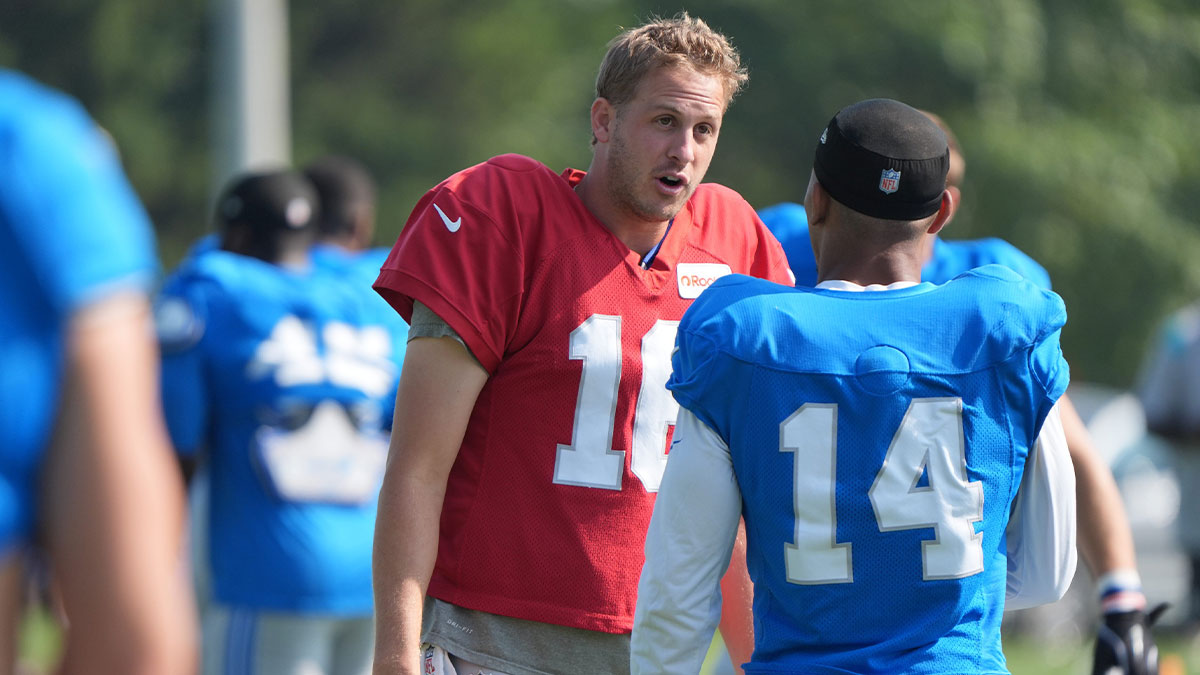 Detroit Lions QB Jared Goff talks with WR Amon-Ra St. Brown during practice at the Lions training facility in Allen Park, Thursday, Aug. 14 2025.