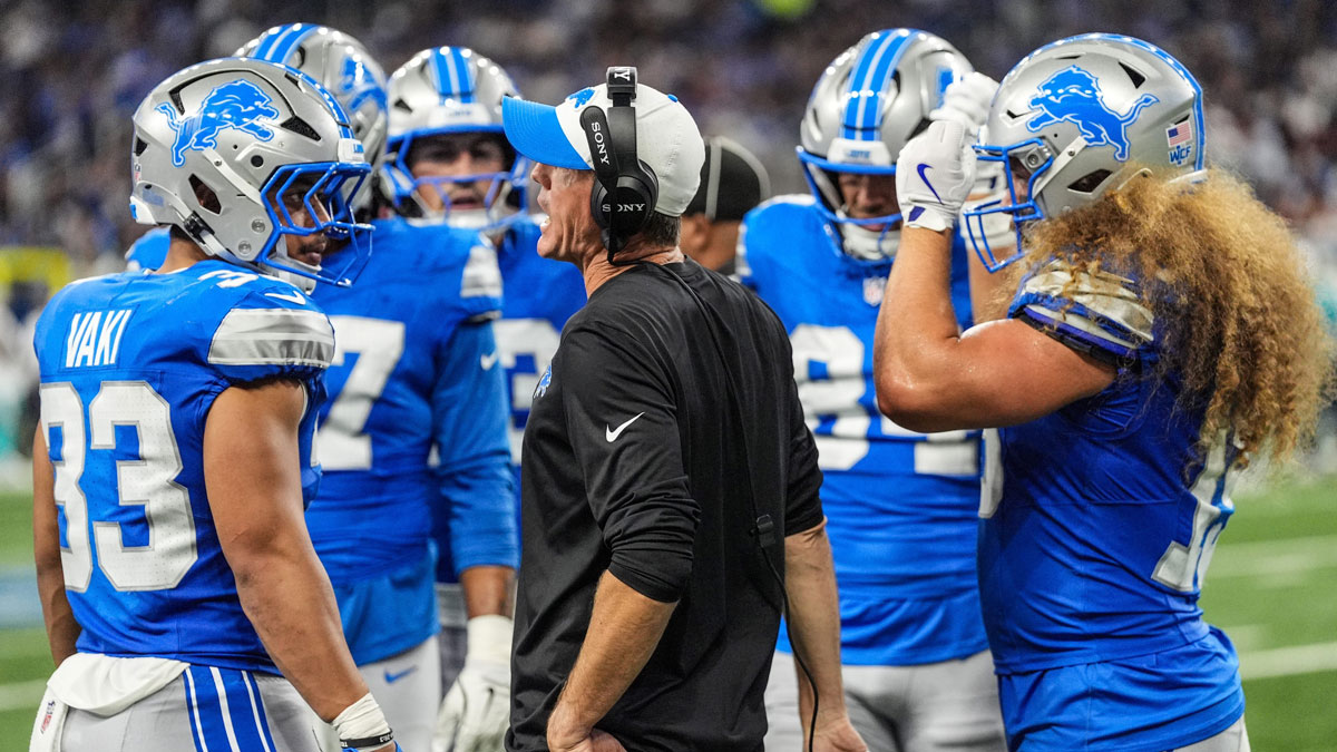 Detroit Lions special teams coordinator Dave Fipp huddles with players before going back onto the field during the first quarter of the preseason game at Ford Field in Detroit, Saturday, Aug. 16, 2025.