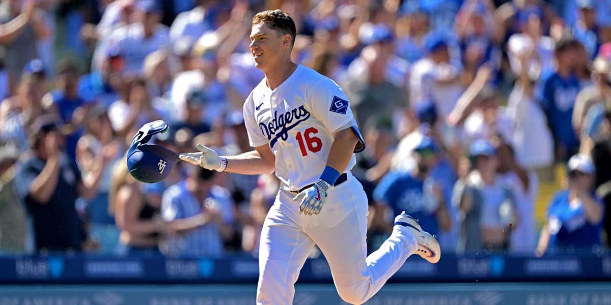 Los Angeles Dodgers catcher Will Smith (16) celebrates as he rounds the bases on a walk-off home run in the ninth inning against the Arizona Diamondbacks at Dodger Stadium.
