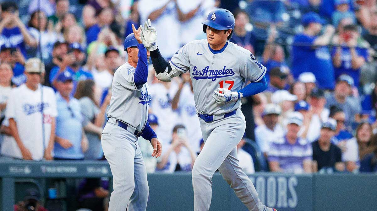 Los Angeles Dodgers designated hitter Shohei Ohtani (17) rounds the bases on a solo home run in the second inning against the Colorado Rockies at Coors Field. Mandatory Credit: Isaiah J. Downing-Imagn Images