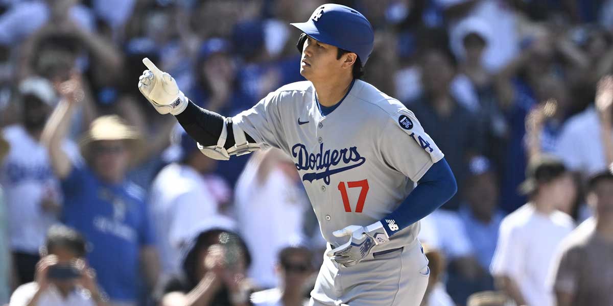 Los Angeles Dodgers designated hitter Shohei Ohtani (17) rounds the bases after hitting a solo home run during the ninth inning against the San Diego Padres at Petco Park.