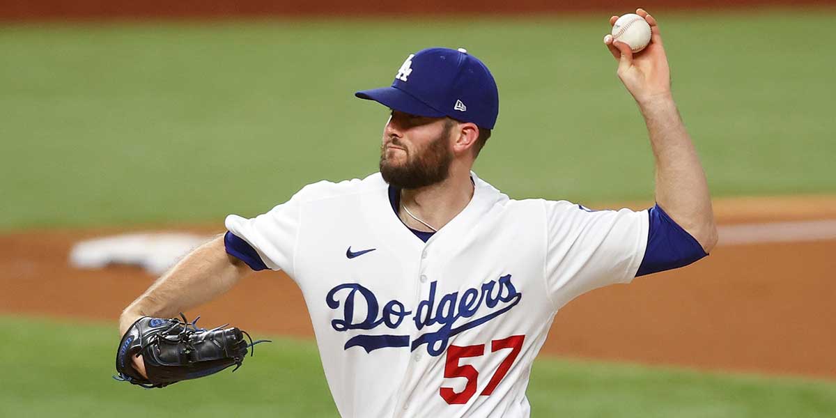 Los Angeles Dodgers relief pitcher Alex Wood (57) pitches during the seventh inning against the Atlanta Braves in game two of the 2020 NLCS at Globe Life Field.