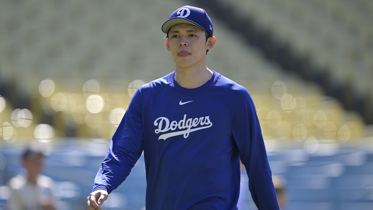Los Angeles Dodgers starting pitcher Roki Sasaki (11) walks on the field prior to the game against the Los Angeles Dodgers at Dodger Stadium.