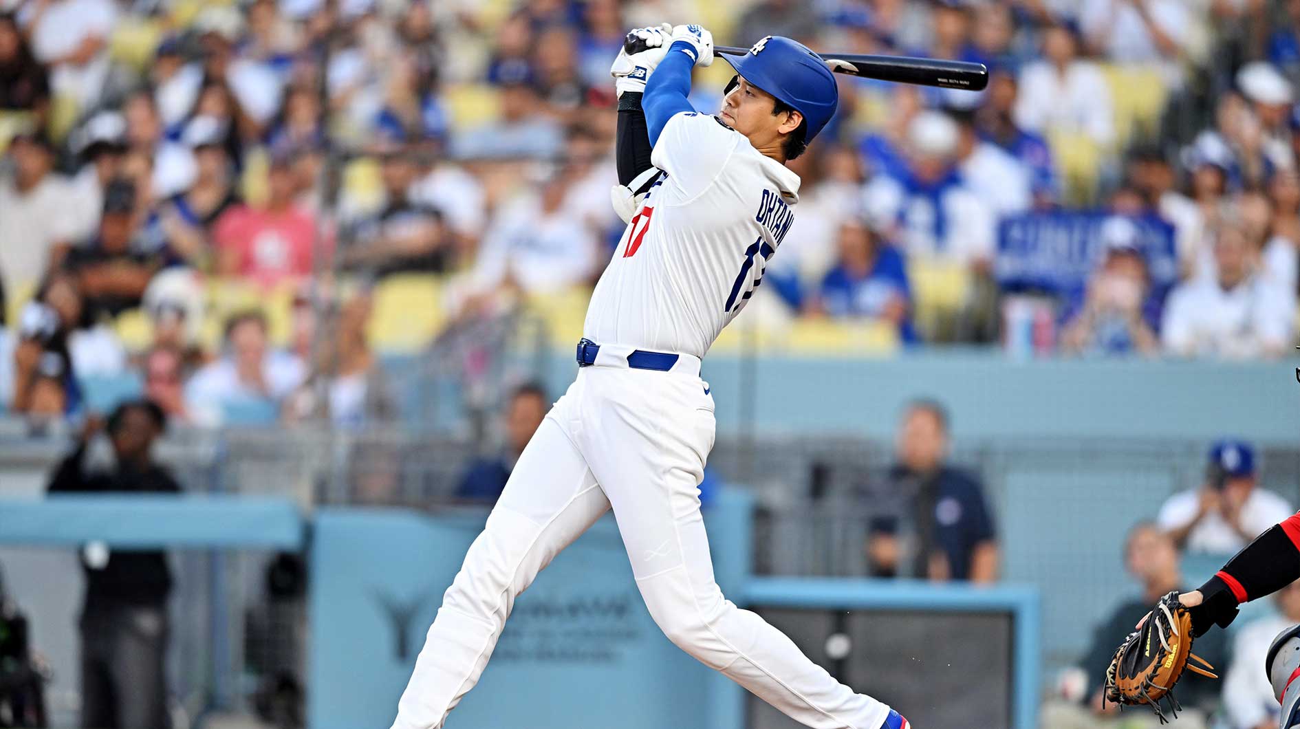 Los Angeles Dodgers two-way player Shohei Ohtani (17) hits a double during the first inning against the St. Louis Cardinals at Dodger Stadium.