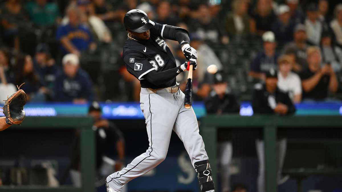 Chicago White Sox center fielder Luis Robert Jr. (88) hits a home run against the Seattle Mariners during the ninth inning at T-Mobile Park.