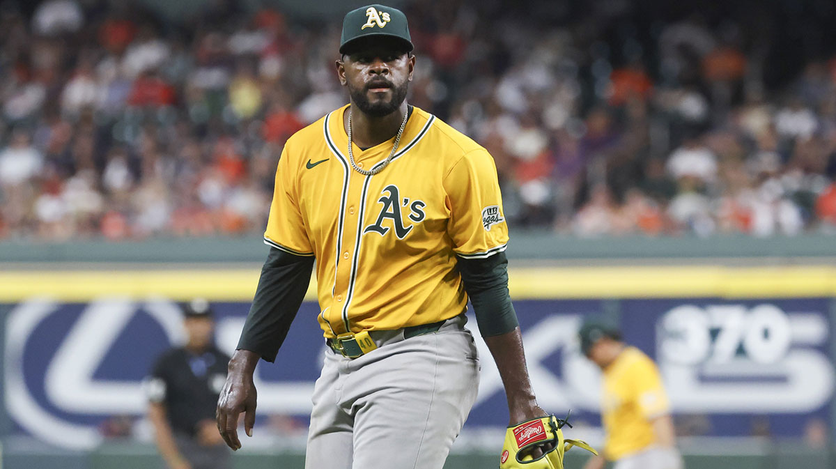 Athletics starting pitcher Luis Severino (40) walks off the field after pitching during the second inning against the Houston Astros at Daikin Park.