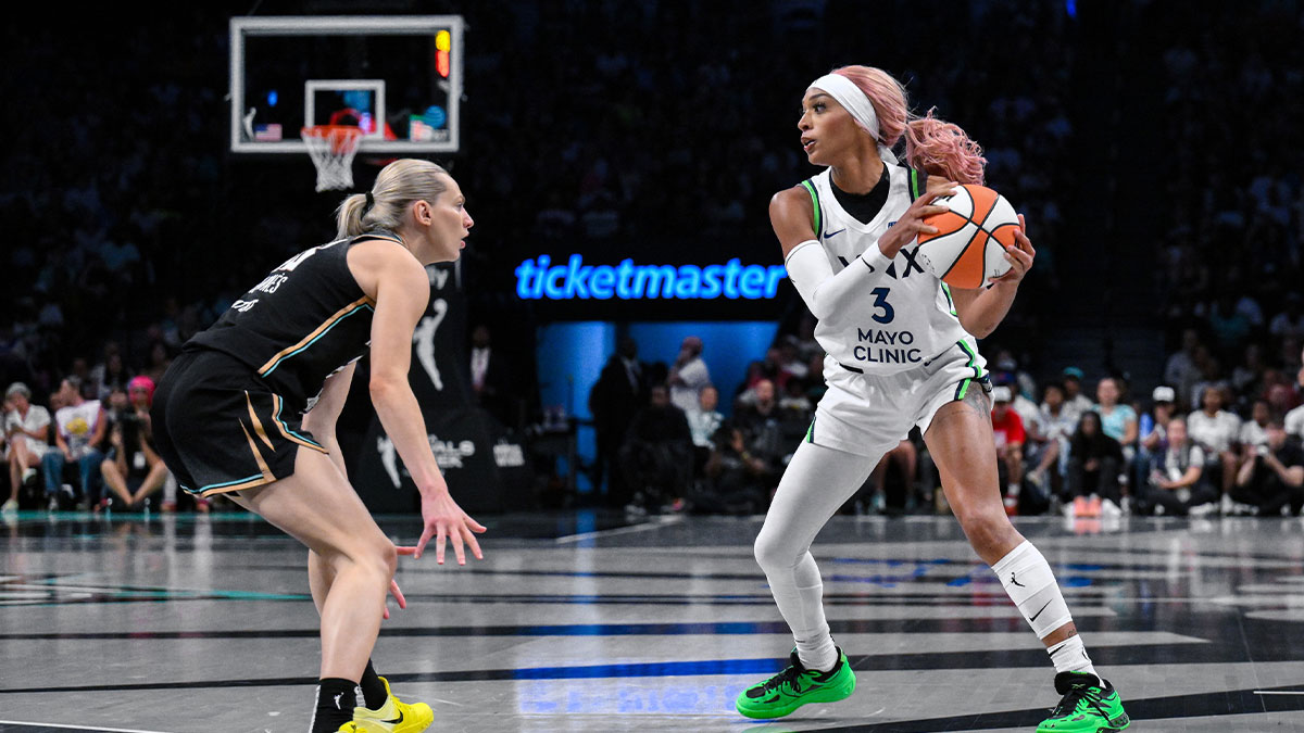 Minnesota Lynx guard DiJonai Carrington (3) sets the play while defended by New York Liberty guard Marine Johannes (23) during the second half at Barclays Center.