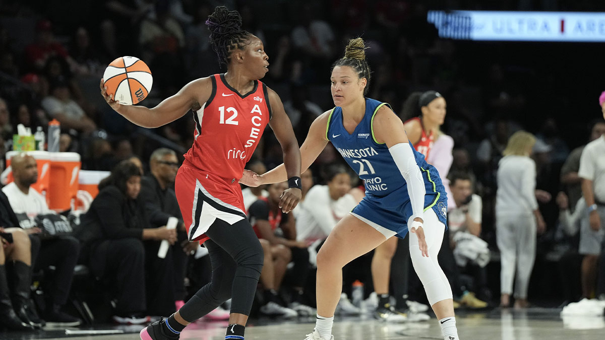 Minnesota Lynx guard Kayla McBride (21) defends against Las Vegas Aces guard Chelsea Gray (12) during the second quarter of their game at Michelob Ultra Arena.