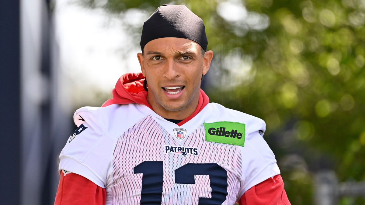 New England Patriots wide receiver Mack Hollins (13) walks to the practice fields for training camp