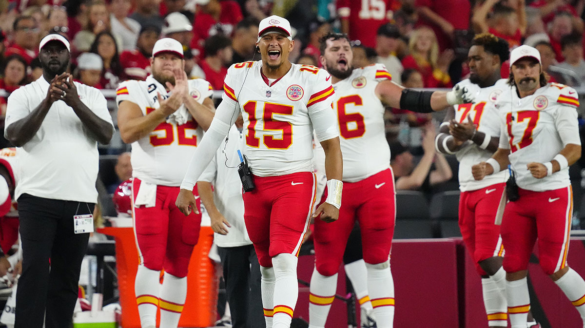 Chiefs quarterback Patrick Mahomes (15) screams in celebration of a touchdown against the Cardinals during a preseason game at State Farm Stadium on Aug. 9, 2025, in Glendale.