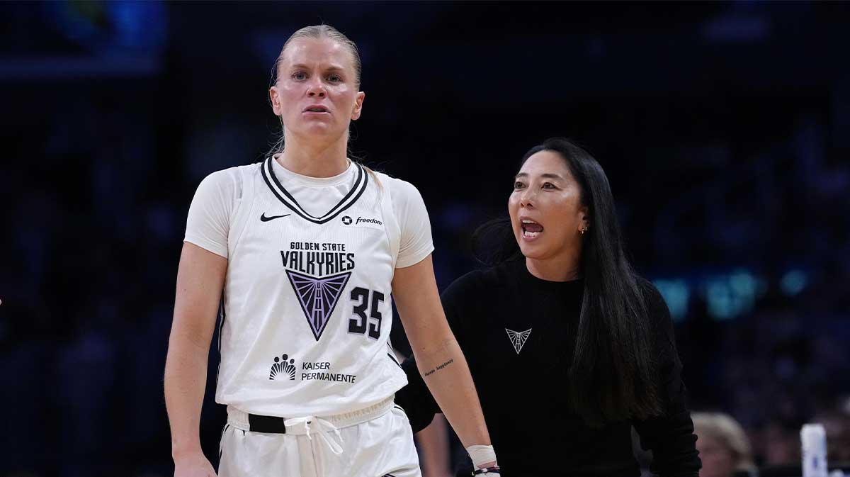 Golden State Valkyries coach Natalie Nakase (right) talks with guard Julie Vanloo (35) in the first half against the LA Sparks at Crypto.com Arena. 