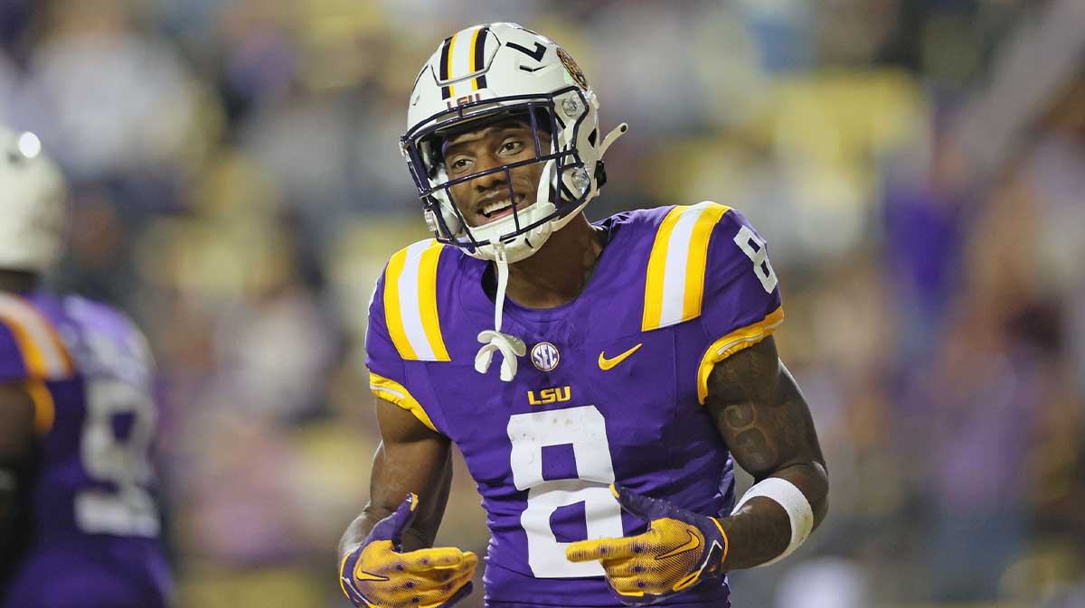 LSU Tigers wide receiver Malik Nabers (8) celebrates his 40-yard touchdown catch in the fourth quarter against the Georgia State Panthers at Tiger Stadium.