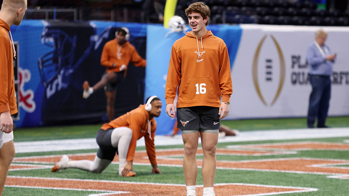 Texas Longhorns quarterback Arch Manning (16) warms up before the Peach Bowl at Mercedes-Benz Stadium.