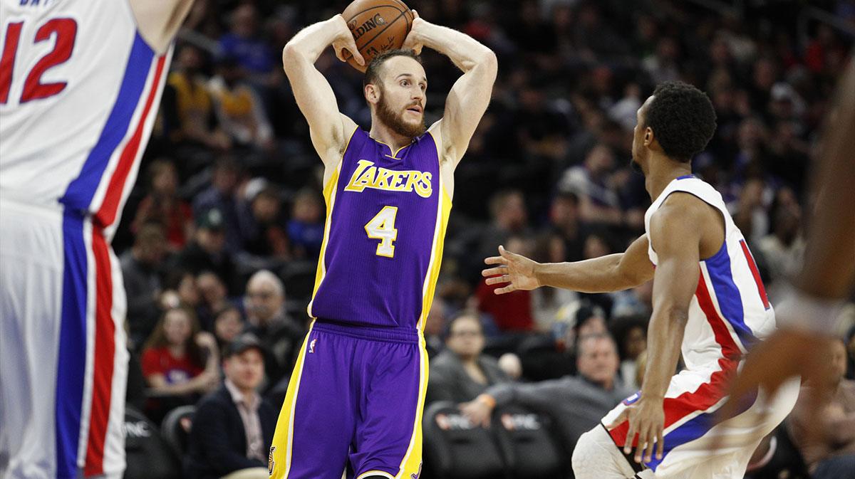 Los Angeles Lakers guard Marcelo Huertas (4) looks to pass the ball against Detroit Pistons guard Ish Smith (14) during the fourth quarter at The Palace of Auburn Hills. Pistons won 121-102.