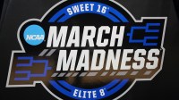 The March Madness logo is seen during the NCAA tournament midwest regional practice day at Lucas Oil Stadium.