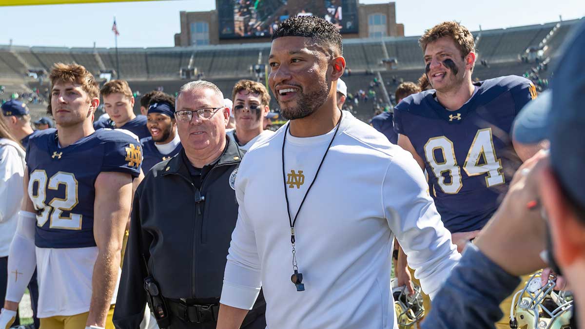 Notre Dame Fighting Irish head coach Marcus Freeman smiles as he walks off the field after the Blue-Gold game at Notre Dame Stadium. 