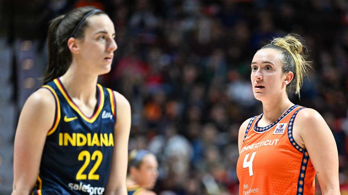 Connecticut Sun guard Marina Mabrey (4) stares at Indiana Fever guard Caitlin Clark (22) in the third quarter during game one of the first round of the 2024 WNBA Playoffs at Mohegan Sun Arena.