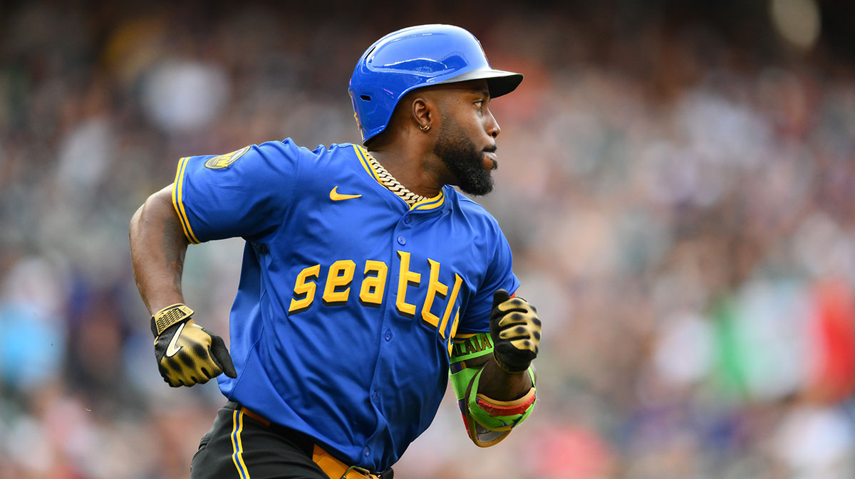 Seattle Mariners left fielder Randy Arozarena (56) runs towards first base after hitting a single against the Tampa Bay Rays during the first inning at T-Mobile Park. 