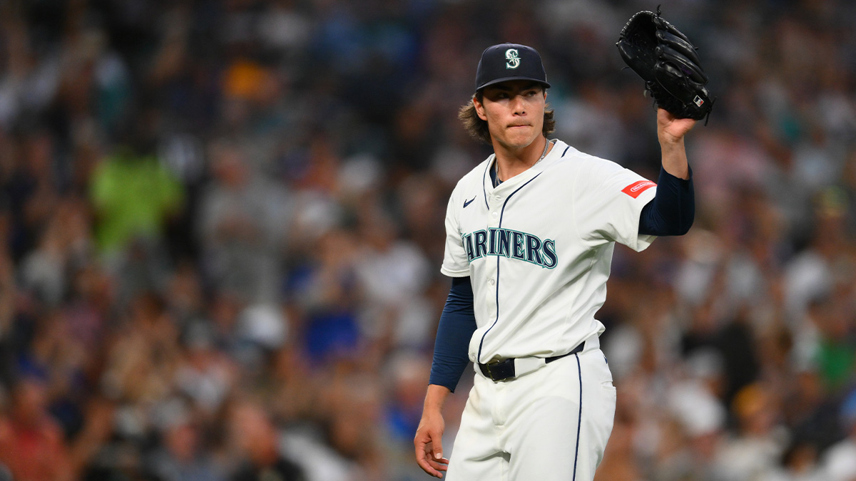 Seattle Mariners starting pitcher Bryan Woo (22) reacts to the final out against the Chicago White Sox during the seventh inning at T-Mobile Park.