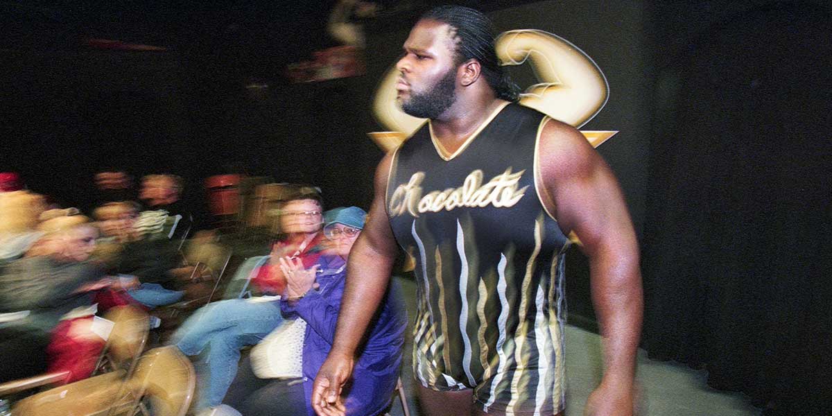 Mark \"Sexual Chocolate\" Henry twists the arm of an opponent during a match at Ohio Valley Wrestling.
