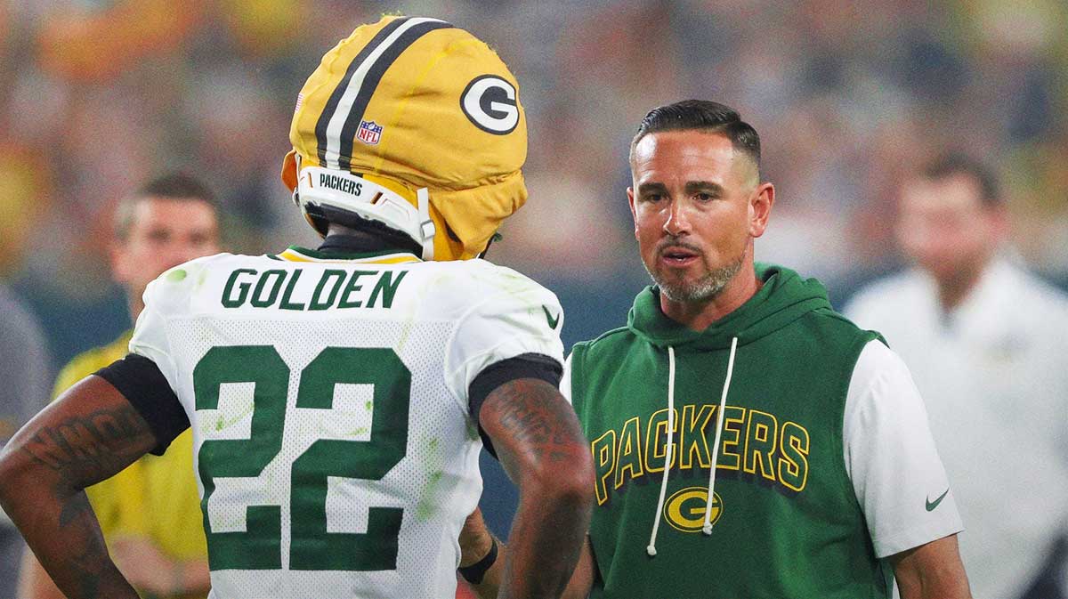 Green Bay Packers head coach Matt LaFleur talks to wide receiver Matthew Golden (22) during Family Night on Saturday, August 2, 2025, at Lambeau Field in Green Bay, Wis. 