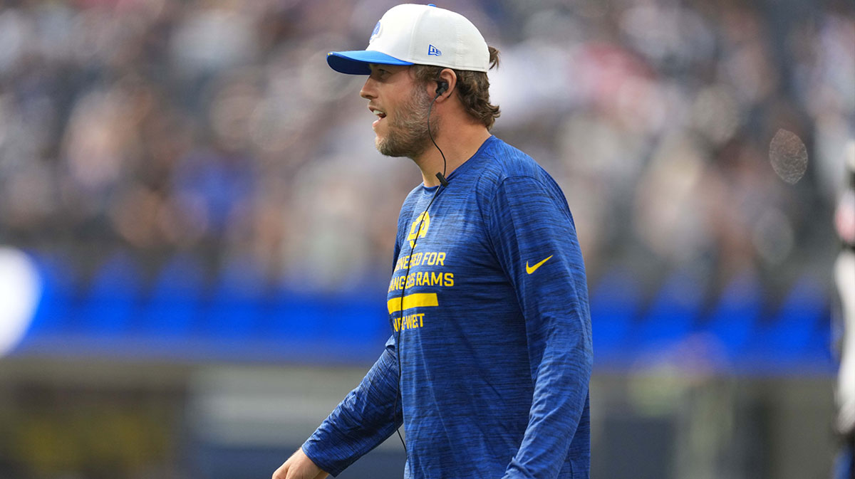Los Angeles Rams quarterback Matthew Stafford watches from the sidelines during the first half against the Dallas Cowboys at SoFi Stadium.