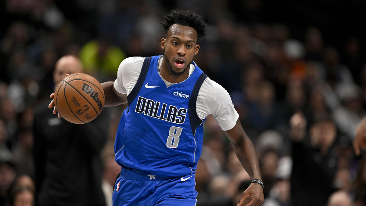 Dallas Mavericks forward Olivier-Maxence Prosper (8) brings the ball up court against the Sacramento Kings during the second quarter at the American Airlines Center.