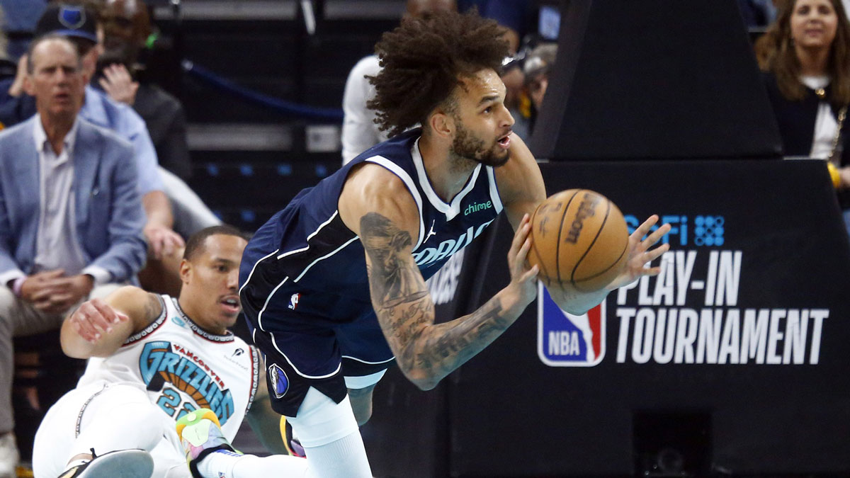 Dallas Mavericks center Dereck Lively II (2) passes after a stealing the ball from Memphis Grizzlies guard Desmond Bane (22) during the first quarter at FedExForum.
