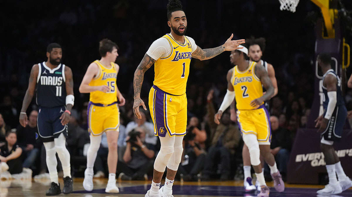 Lakers guard D'Angelo Russell (1) gestures after a three-point basket against the Dallas Mavericks in the first half at Crypto.com Arena