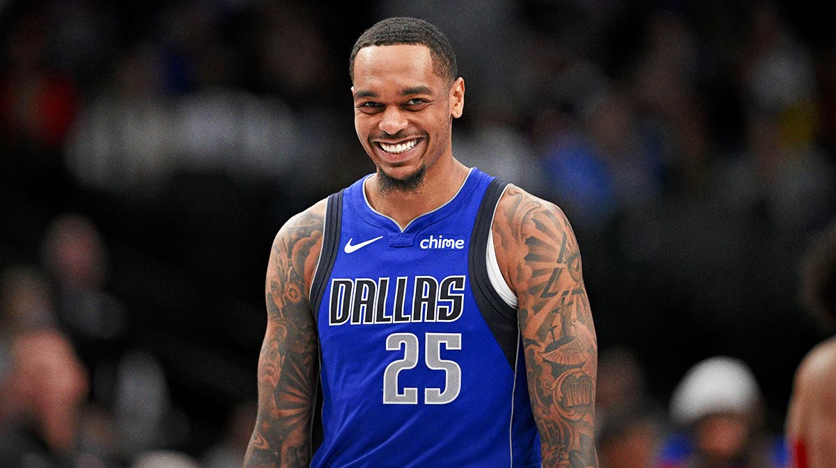 Dallas Mavericks forward P.J. Washington (25) smiles for the fans during the second half of the game against the Detroit Pistons at the American Airlines Center.