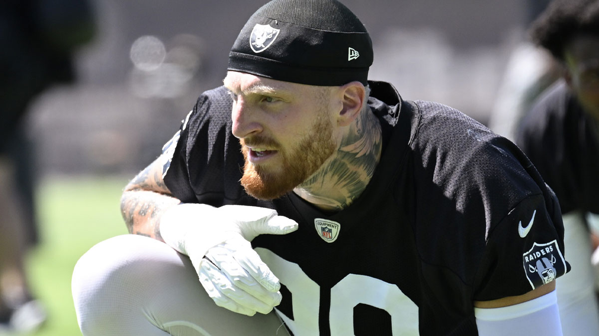 Las Vegas Raiders defensive end Maxx Crosby (98) looks on during the team stretch during Las Vegas Raiders Minicamp at Intermountain Health Performance Center.