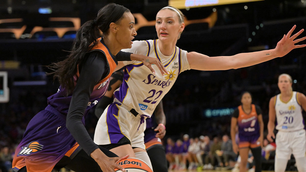 Phoenix Mercury forward DeWanna Bonner (14) is defended by Los Angeles Sparks forward Cameron Brink (22) as she drives to the basket during the first half at Crypto.com Arena.