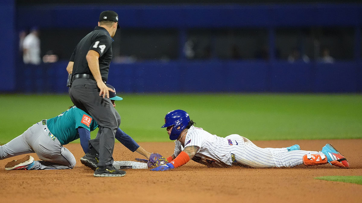 New York Mets catcher Francisco Alvarez (4) slides into second after hitting a double against the Seattle Mariners in the seventh inning at Journey Bank Ballpark at Historic Bowman Field.