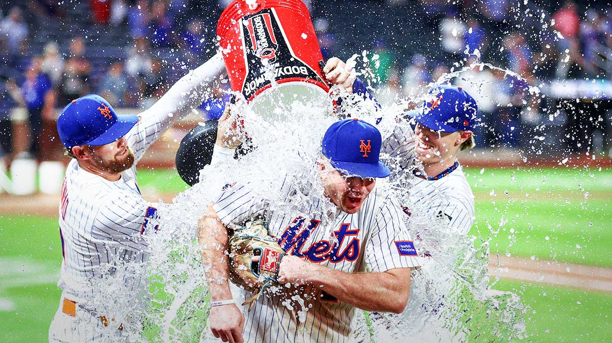 New York Mets first baseman Pete Alonso (20) is doused with water by left fielder Brandon Nimmo (9) and third baseman Brett Baty (7) after becoming the franchise all-time home leader at Citi Field.