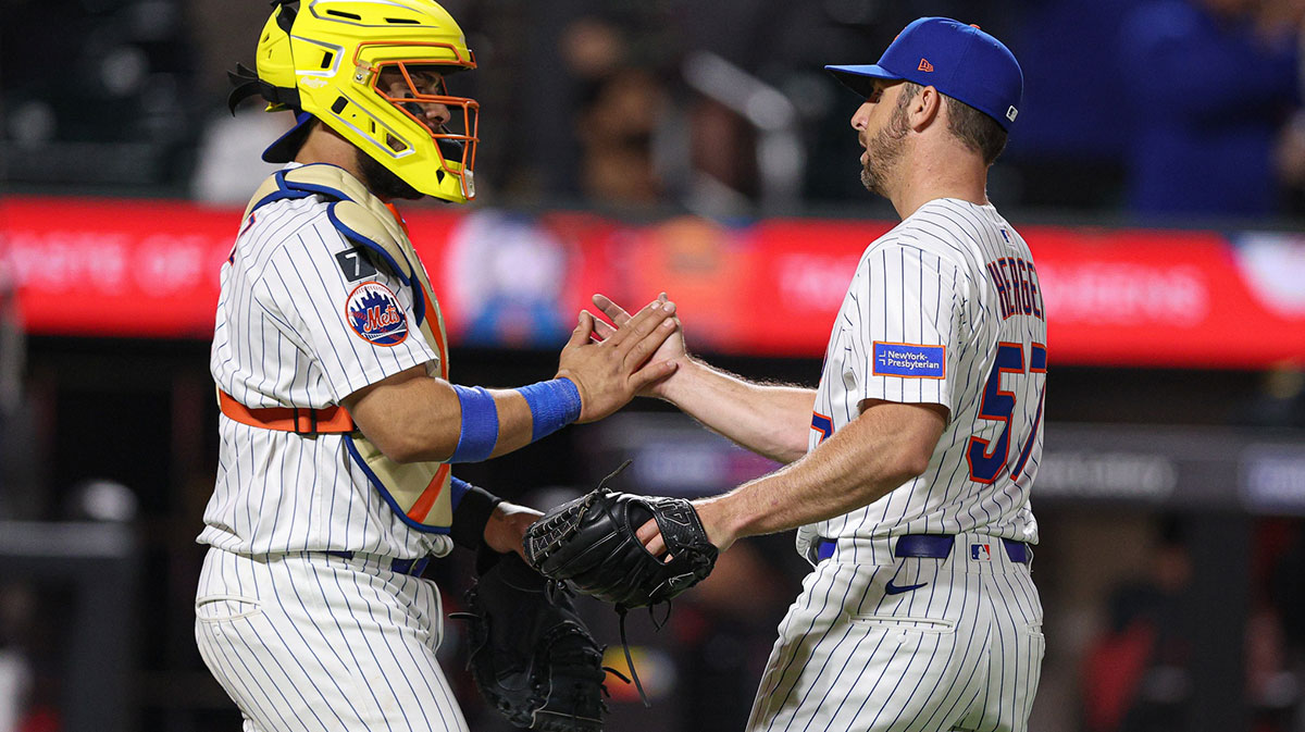 New York Mets relief pitcher Kevin Herget (57) celebrates with New York Mets catcher Francisco Alvarez (4) after defeating the Arizona Diamondbacks at Citi Field.