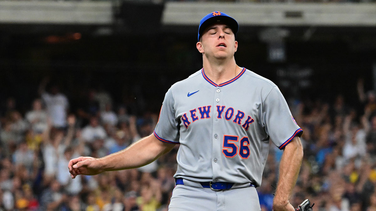 New York Mets pitcher Ryan Helsley (56) reacts after giving up the tying run in the eighth inning against the Milwaukee Brewers at American Family Field.