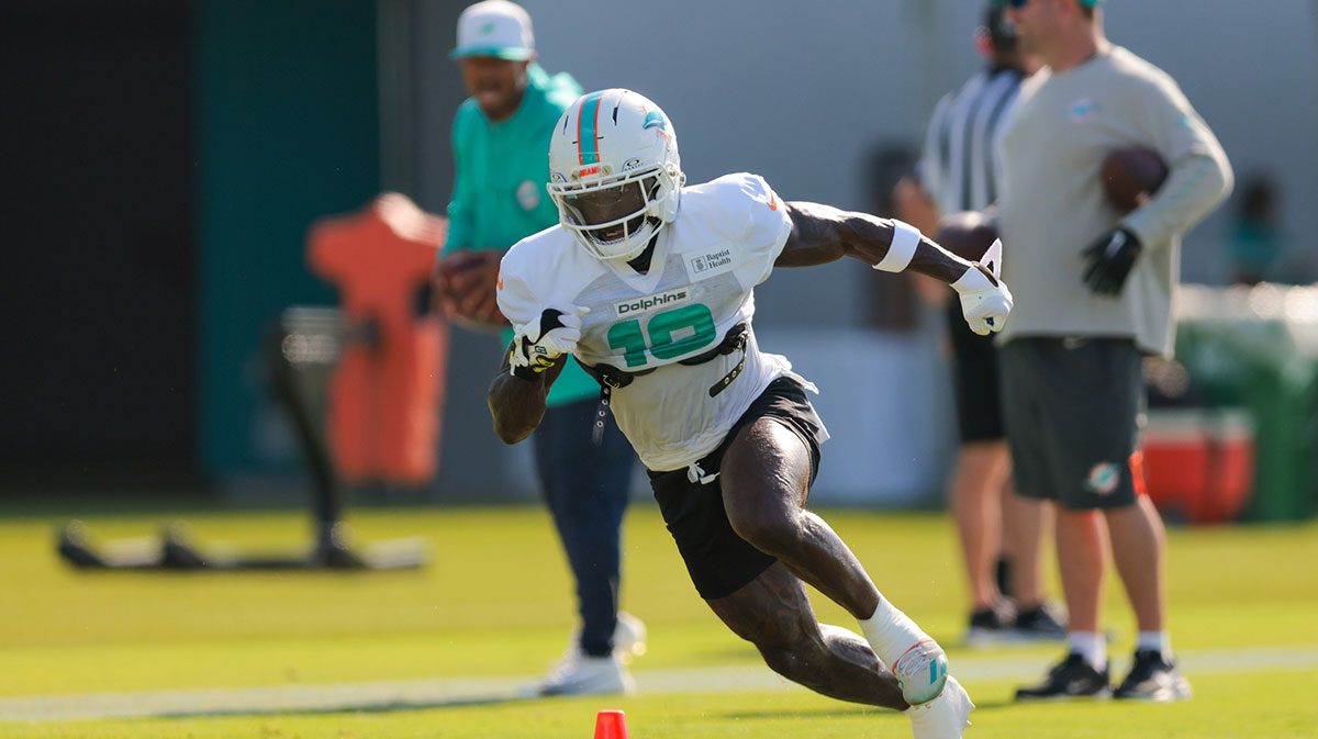 Miami Dolphins wide receiver Tyreek Hill (10) works during training camp at Baptist Health Training Complex.