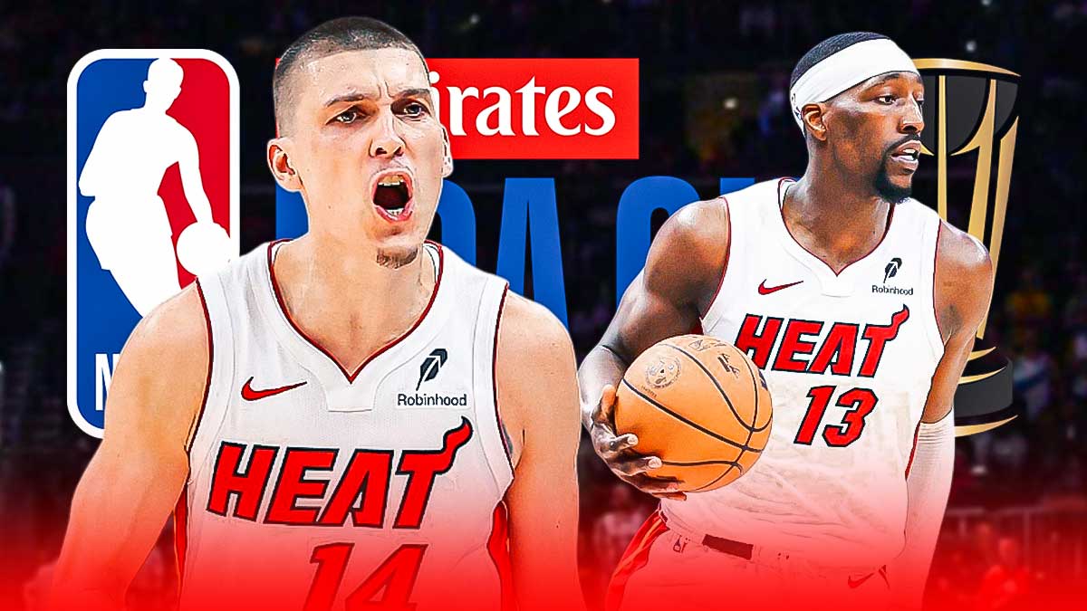 Miami Heat stars Tyler Herro and Bam Adebayo in front of the NBA Cup logo for the in-season tournament in front of Kaseya Center.