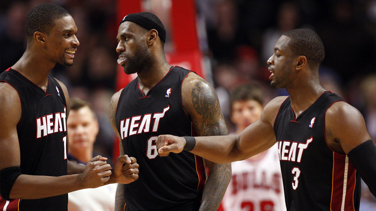 Miami Heat players Chris Bosh (1) and LeBron James (6) and Dwyane Wade (3) during the fourth quarter against the Chicago Bulls at the United Center. The Bulls won 93-89.