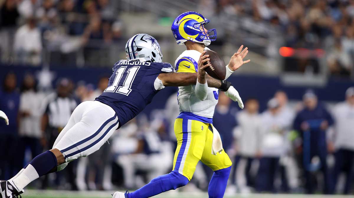 Oct 29, 2023; Arlington, Texas, USA; Dallas Cowboys linebacker Micah Parsons (11) attempts to sack Los Angeles Rams quarterback Matthew Stafford (9) in the second quarter at AT&T Stadium.