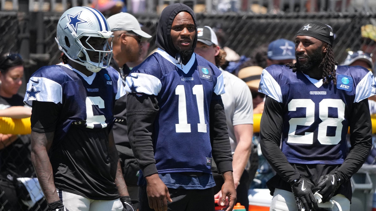 Dallas Cowboys safety Donovan Wilson (6), defensive end Micah Parsons (11) and safety Malik Hooker (28) watch from the sidelines at training camp at the River Ridge Fields.