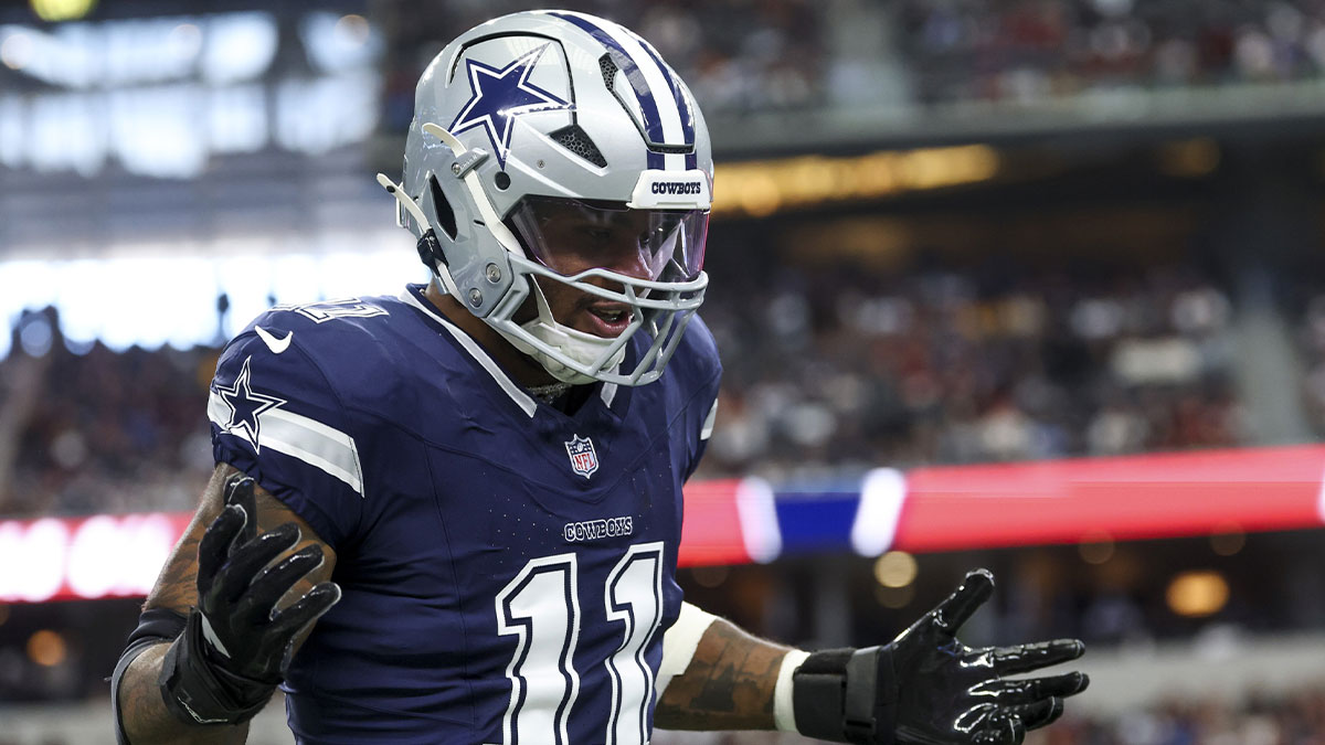 Dallas Cowboys linebacker Micah Parsons (11) celebrates after a sack during the first quarter against the Washington Commanders at AT&T Stadium.