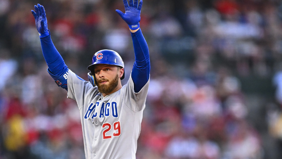 Chicago Cubs first baseman Michael Busch (29) celebrates after hitting a double against the Los Angeles Angels during the third inning at Angel Stadium.