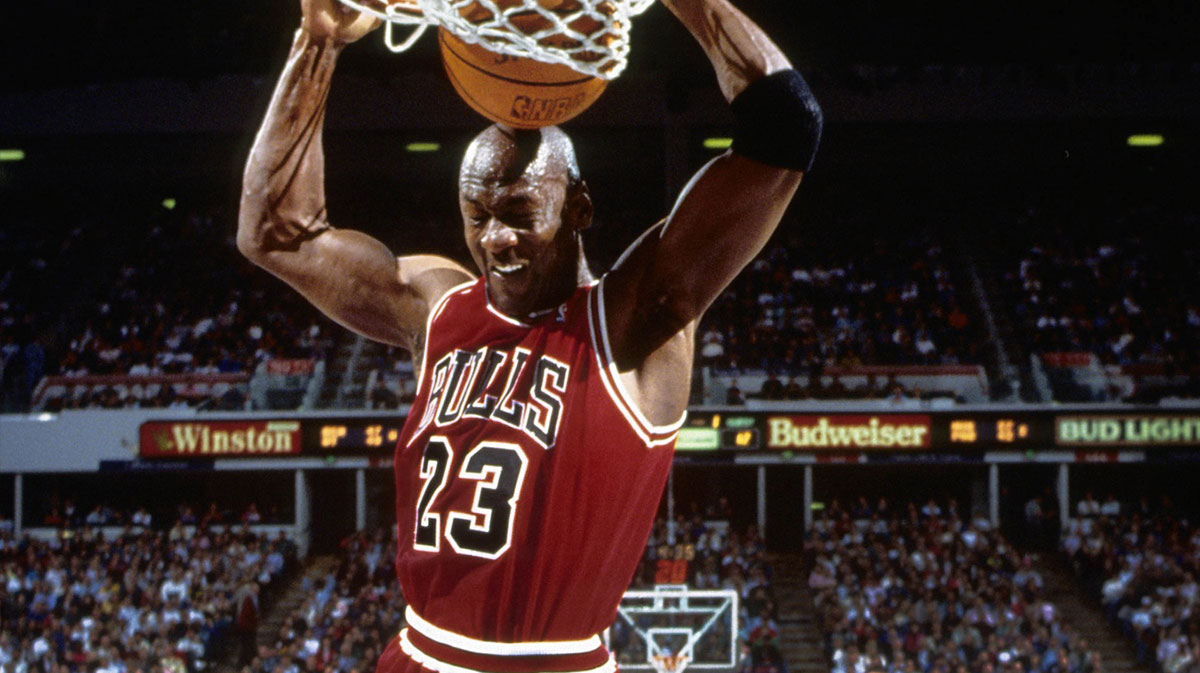Chicago Bulls guard Michael Jordan (23) dunks the ball against the Sacramento Kings at Arco Arena.