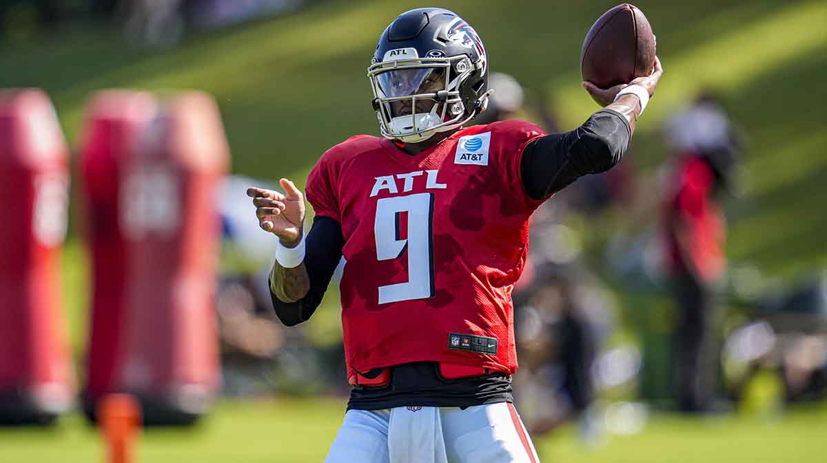 Atlanta Falcons quarterback Michael Penix Jr. (9) passes the ball during practice at training camp at IBM Performance Field.