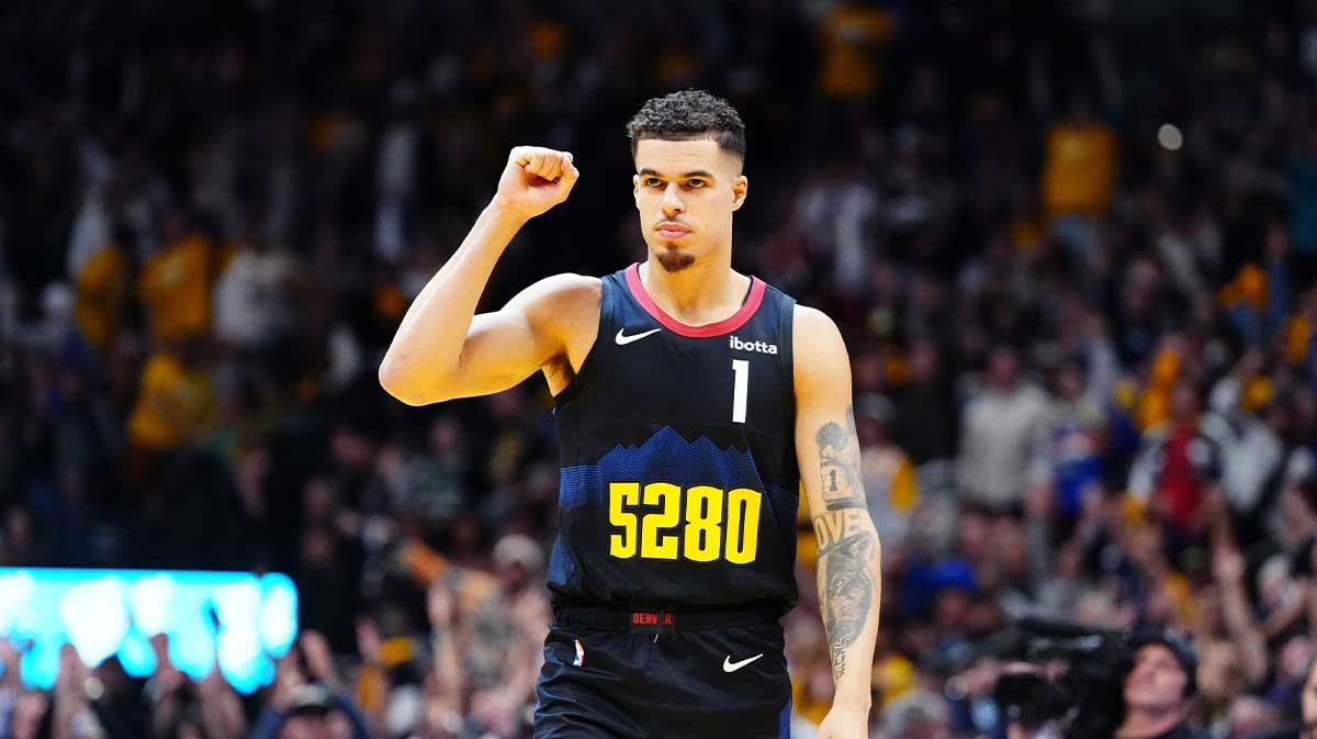 Denver Nuggets forward Michael Porter Jr. (1) reacts to a score in the third quarter against the LA Clippers at Ball Arena.
