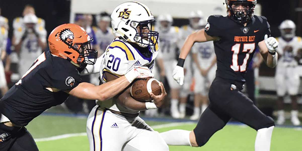 Brother Rice safety Rocco Milia takes down De La Salle senior running back Muzanenhamo Kahari. Brother Rice earns a 16-14 win against De La Salle on Sept. 21. Rocco Milia Defense