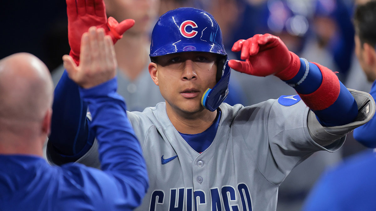 Chicago Cubs catcher Miguel Amaya (9) celebrates with teammates after hitting a three-run home run against the Miami Marlins during the fourth inning at loanDepot Park.