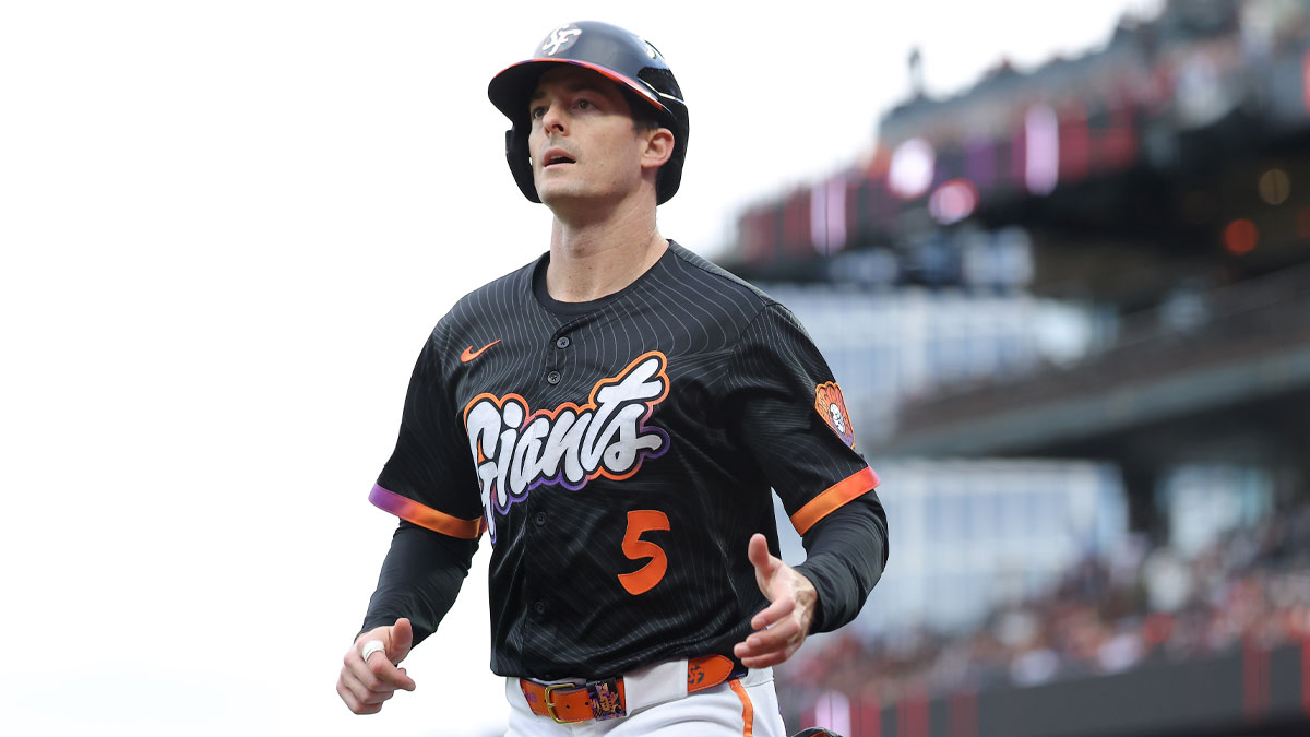 San Francisco Giants right fielder Mike Yastrzemski (5) jogs to the dugout after scoring a run against the Philadelphia Phillies during the second inning at Oracle Park.